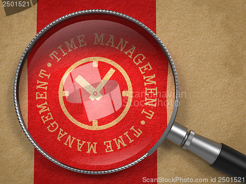 Image of Magnifying Glass with Time Management Concept.