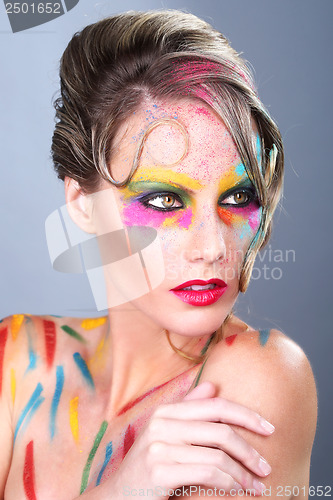 Image of Woman With Extreme Makeup Design With Colorful Powder