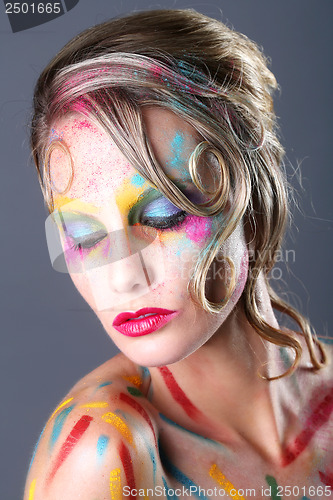 Image of Woman With Extreme Makeup Design With Colorful Powder