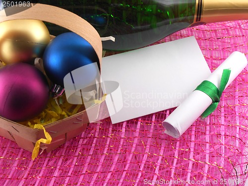 Image of new year greeting card, champagne bottle and christmas balls