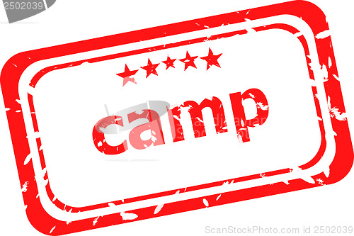 Image of camp on red rubber stamp over a white background