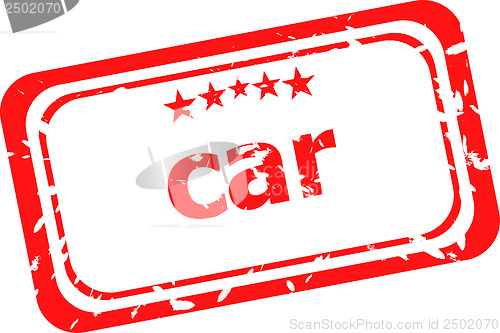 Image of car on red rubber stamp over a white background