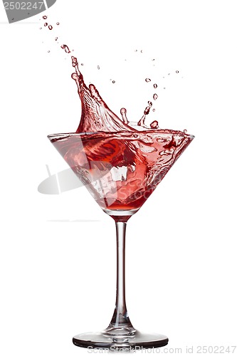 Image of Red cocktail with splash isolated on white