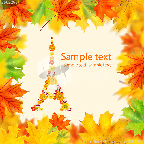 Image of eiffel tower of flowers with autumn leaves frame