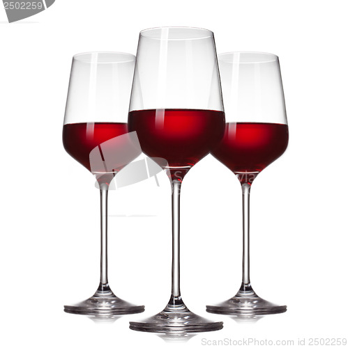 Image of 3 glasses of red wine isolated on white