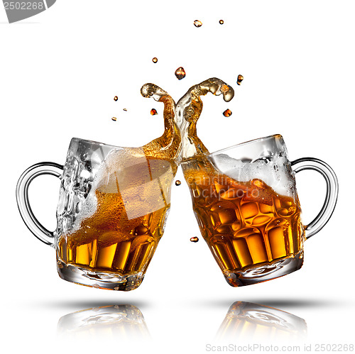 Image of Beer splash in glass isolated on white