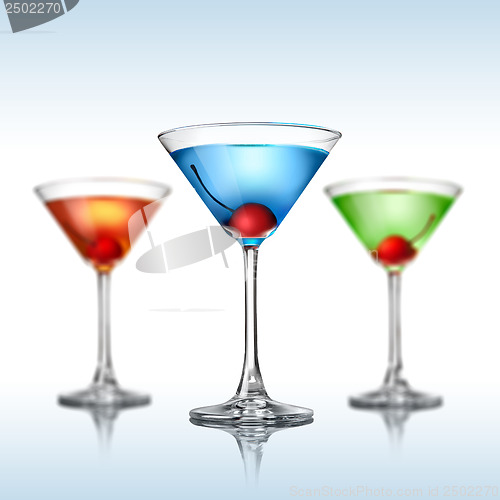 Image of Different martini color cocktails on white