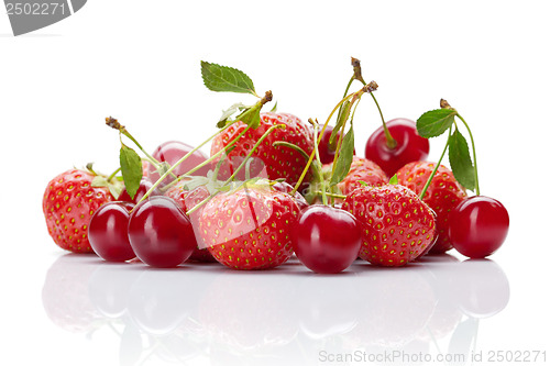 Image of Red cherry with strawberry on white