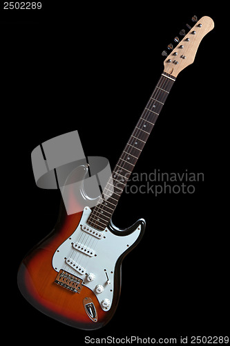 Image of electric guitar isolated on black