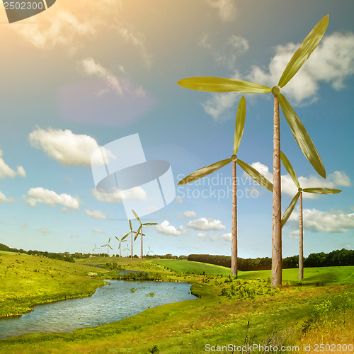 Image of Green energy concept - natural wind generator turbines on summer