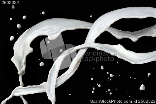 Image of milk splash isolated on black background