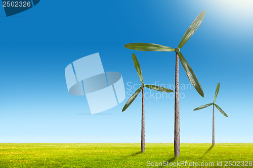 Image of Green energy concept - natural wind generator turbines on summer