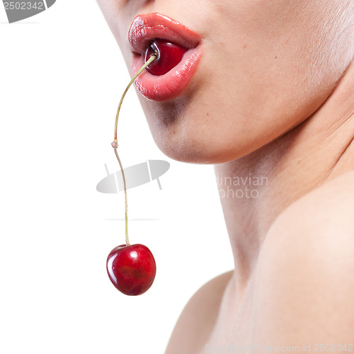 Image of Young woman with cherry isolated on white