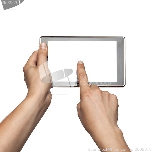 Image of Hand holding Tablet PC isolated on white