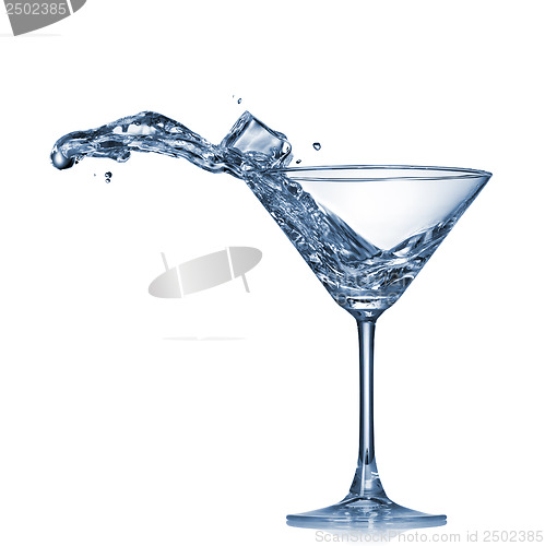 Image of Martini splash in glass isolated on white