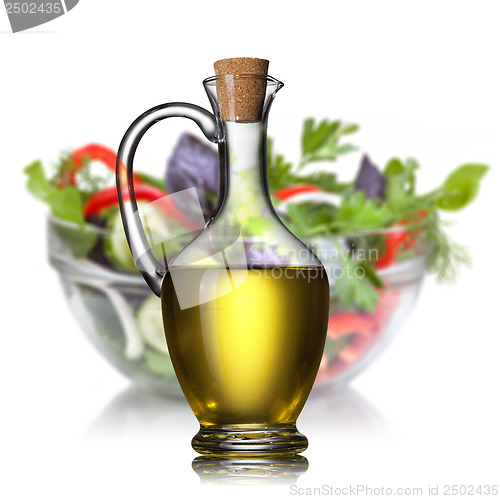 Image of Salad and oil isolated on white