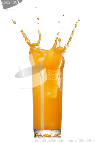 Image of orange juice splash in the glass isolated on white