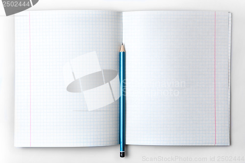 Image of open empty notebook with lined pages and pencil