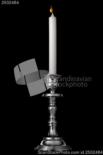 Image of Silver candlestick with candle isolated on black