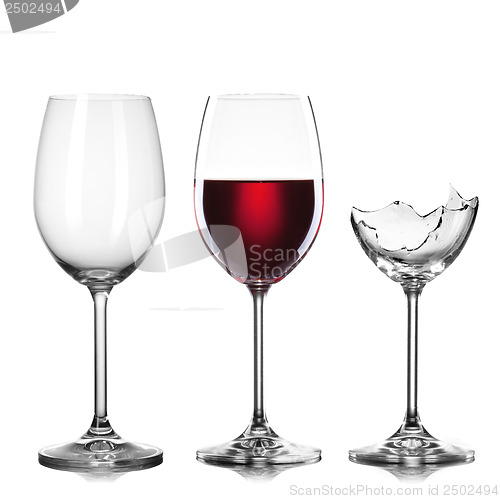 Image of empty, full of wine and broken wineglasses isolated on white