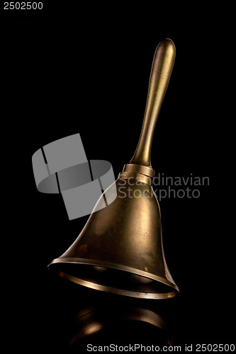 Image of Hand Bell isolated on a black background
