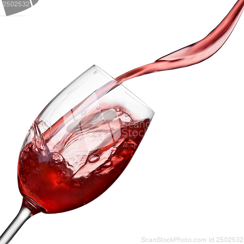 Image of Splash of wine in glass isolated on white