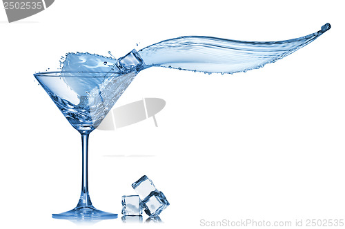 Image of Martini splash in glass isolated on white