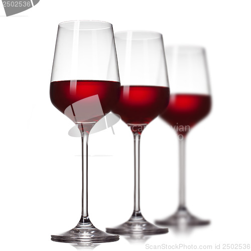 Image of Red wine in glasses isolated on white