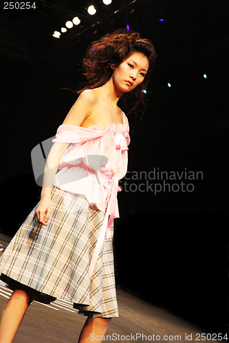 Image of Asian model on the catwalk - EDITORIAL ONLY