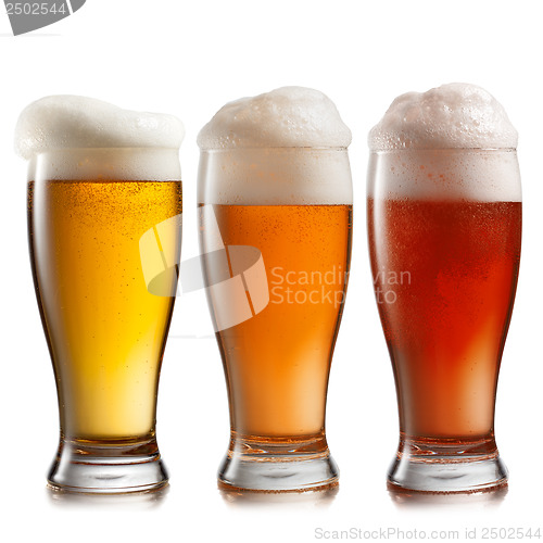 Image of Different beer in glasses isolated on white background