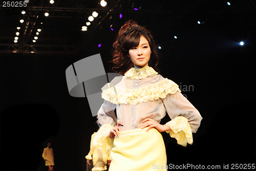 Image of Asian model on the catwalk during a fashion show - EDITORIAL ONL