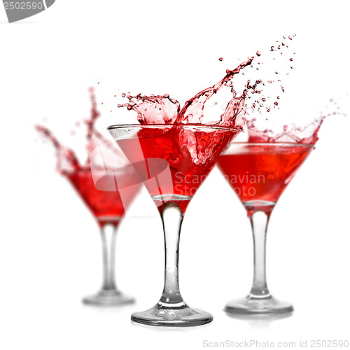 Image of Red cocktails with splash isolated on white