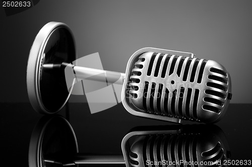 Image of Retro microphone on grey