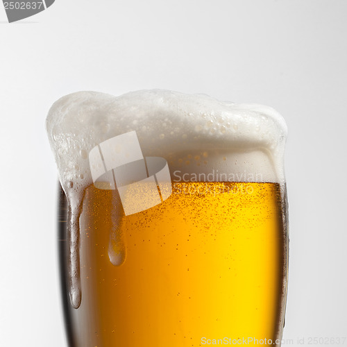 Image of Beer in glass isolated on white background