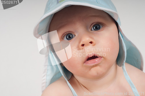 Image of Baby boy in blue hat