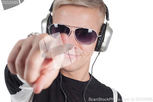 Image of Man with headphones pointing her finger