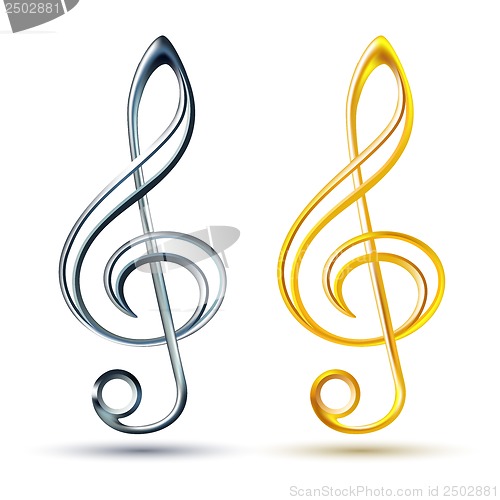 Image of Gold and silver treble clef on white background