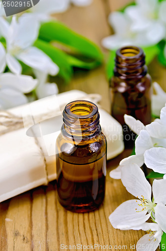 Image of Oil aromatic and white soap with flowers of apple