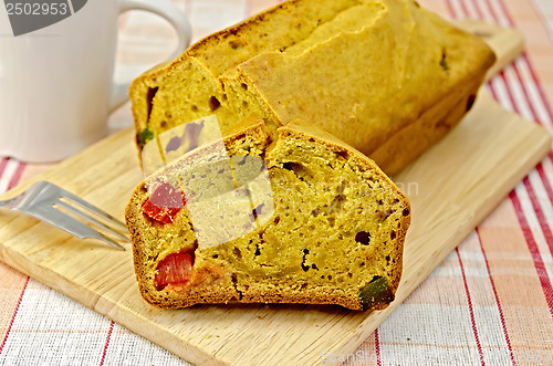 Image of Fruitcake pumpkin with candied fruit on a napkin