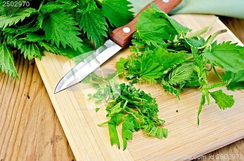 Image of Nettle on the board with a knife and napkin