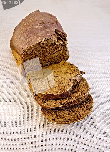 Image of Rye homemade bread on rough bagging