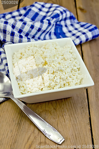 Image of Curd with blue napkin on the board