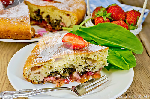 Image of Pie with strawberry and sorrel on the board