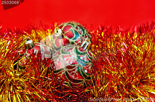 Image of Christmas red balls with tinsel