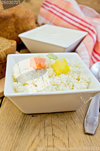 Image of Curd with colored sugar and sour cream