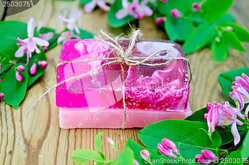 Image of Soap homemade pink with flowers of honeysuckle