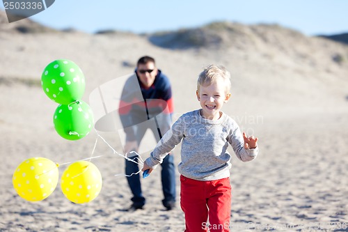 Image of family at the beach