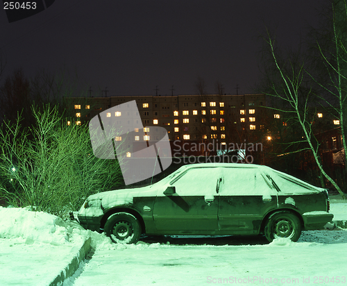 Image of Old Car under Snow