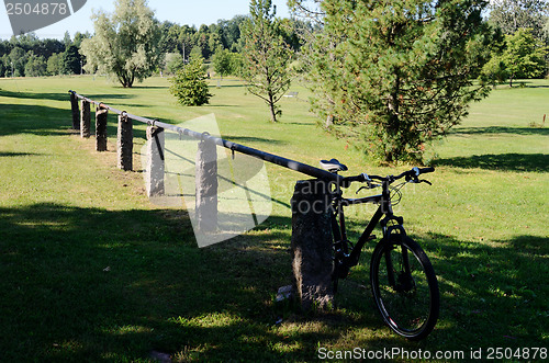 Image of rural landscape with a bicycle parked