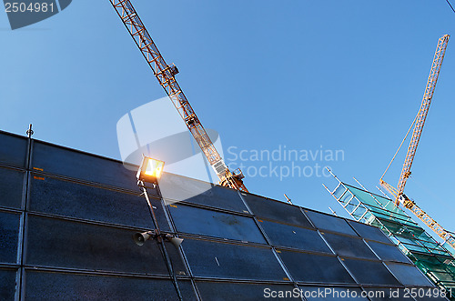 Image of industrial landscape, construction, cranes 